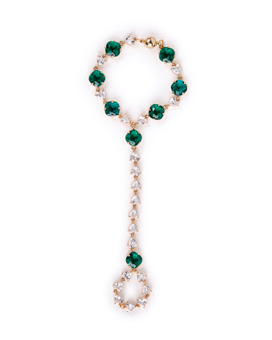 Handcrafted crystal hand chain with Austrian crystals and 18K gold plating. Elegant bridal hand jewelry, finger bracelet, and statement accessory for weddings and special occasions.